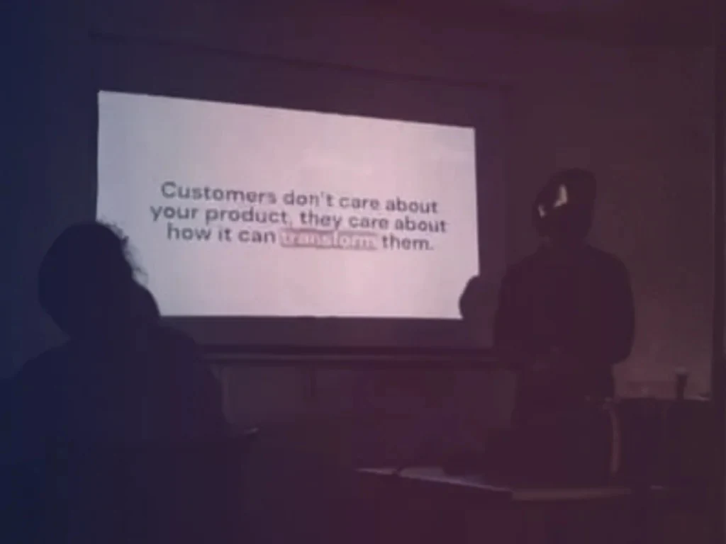 Rey presenting growth strategy to an audience